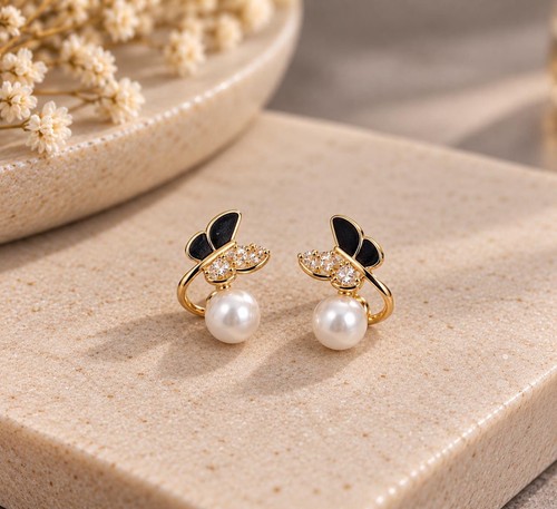 Butterfly pearl stud earrings - pearl,